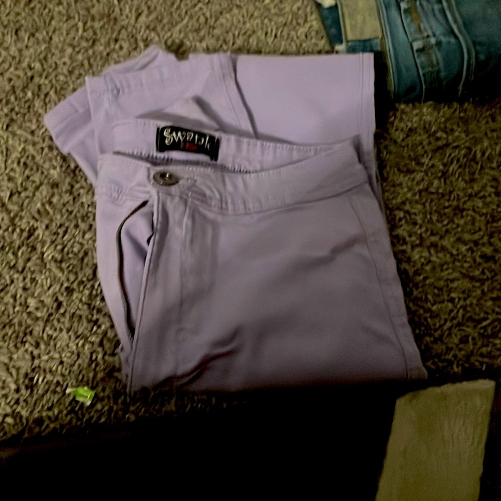 Pants are a lavender purple they’re a large and they’re from swank a posh